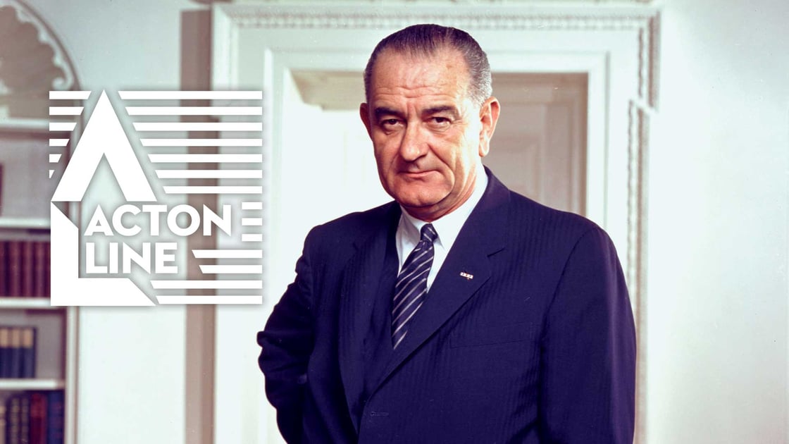 President Lyndon Johnson posing for his White House photo