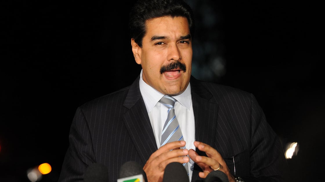 Nicolas Maduro speaking to reporters